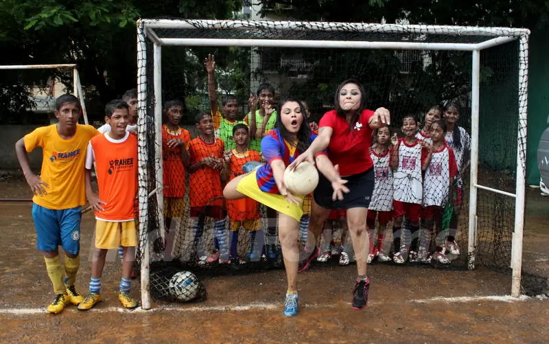 Rakhi Sawant leaps to save a goal