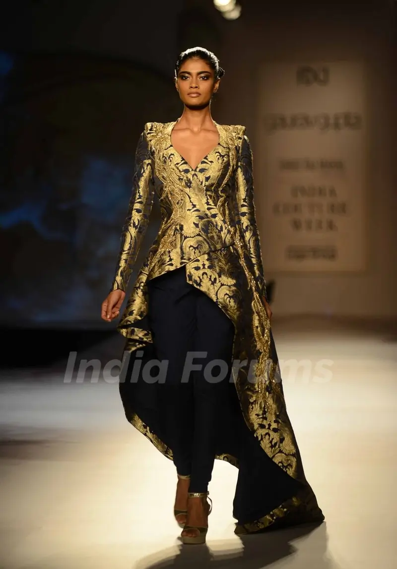 A model walks the ramp at the Indian Couture Week - Day 4