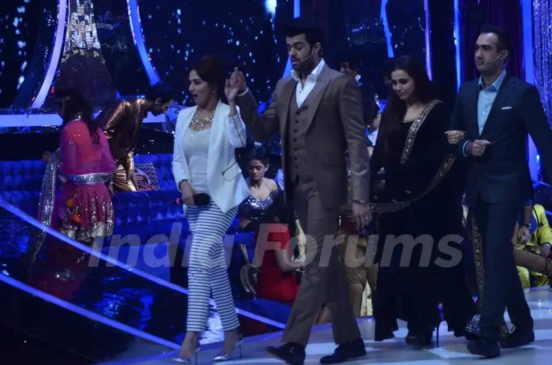 Madhuri and Rani being escorted on Jhalak Dikhla Jaa