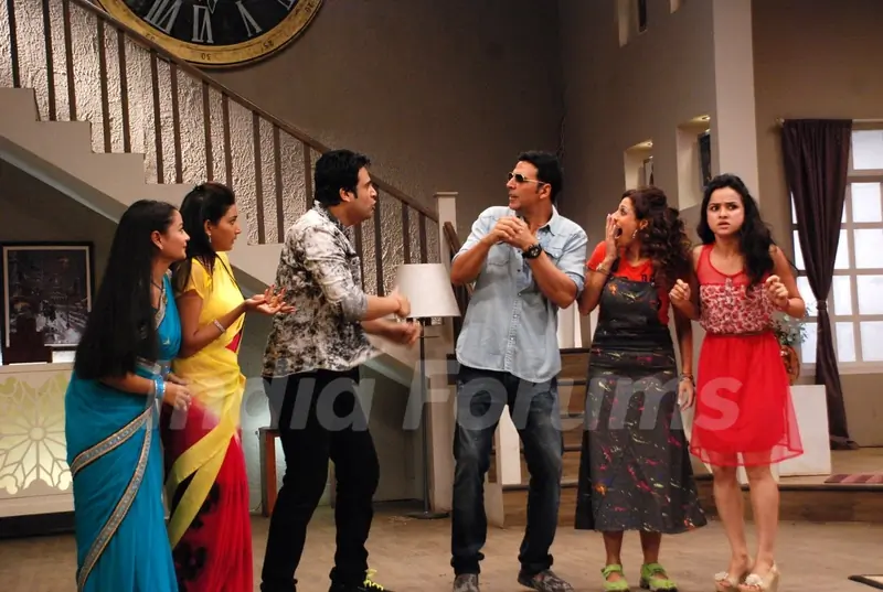 Akshay Kumar and Krushna Abhishek perform an act at the Promotion of It's Entertainment