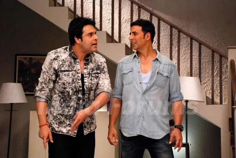 Akshay Kumar and Krushna Abhishek perform an act at the Promotion of It's Entertainment