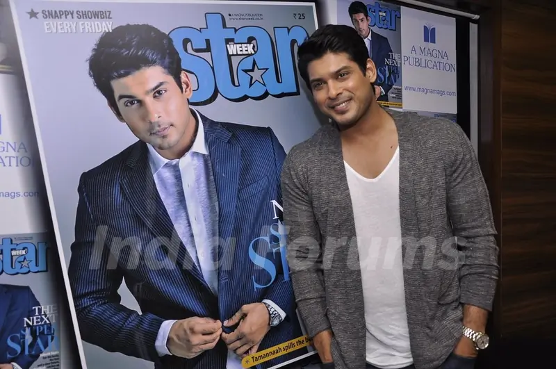 Siddharth Shukla poses with the Starweek Magazine Poster at the Launch