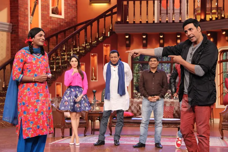 Akshay Kumar performs an act with Gutthi on Comedy Nights with Kapil