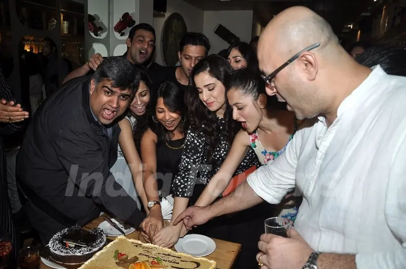 The Cast cutting the cake at 100 Episodes Completion Party