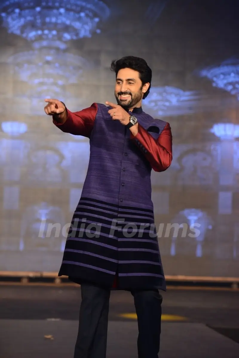 Abhishek Bachchan makes a funky pose while walking the ramp at Manish Malhotra's Show
