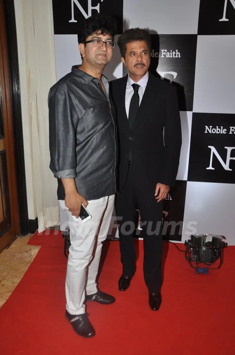 Prasoon Joshi and Anil Kapoor pose for the media at the Birthday Bash cum Launch