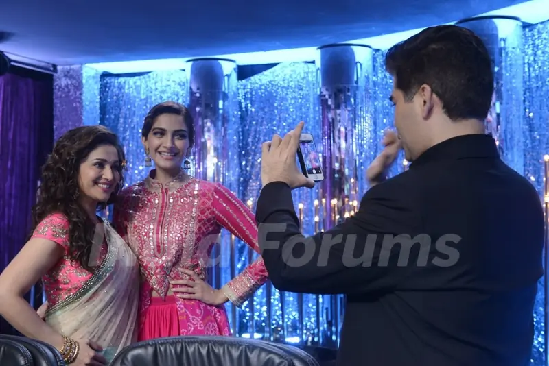 Karan Johar clicks a pic of Sonam Kapoor and Madhuri Dixit on Jhalak Dikhhlaa Jaa Season 7