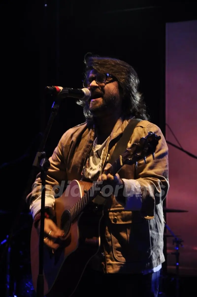 Pritam performs at the Success Bash of Saavn Mobile App