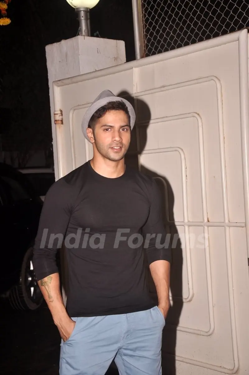 Varun Dhawan poses for the media at the Screening of Finding Fanny
