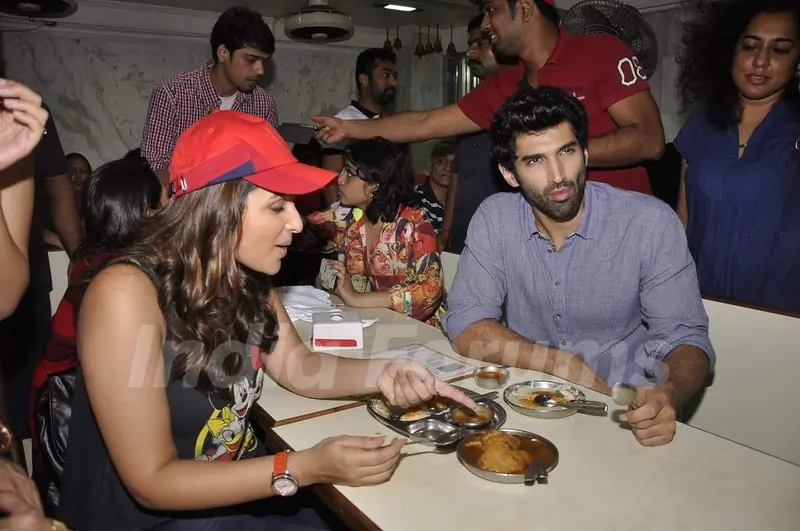 Parineeti and Aditya enjoy their meal at the Flag Off of the Daawat-E-Ishq Food Yatra