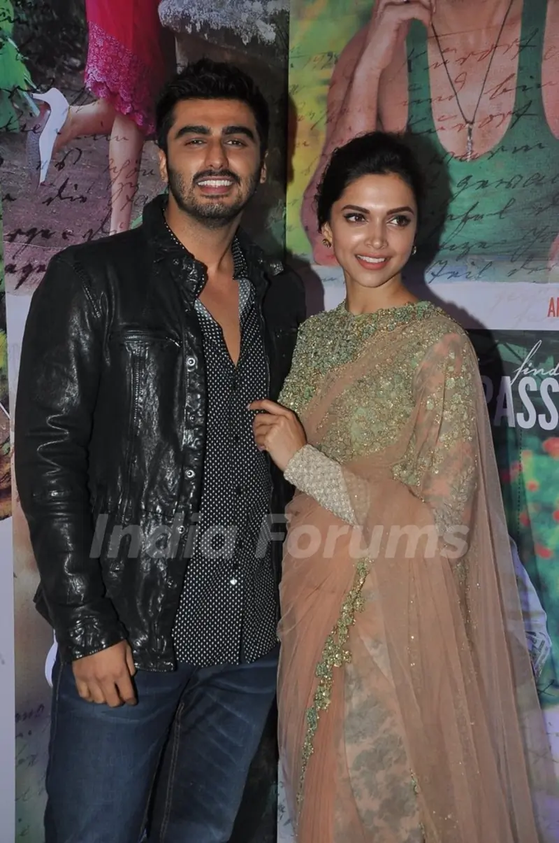 Arjun Kapoor and Deepika Padukone pose for the media at the Success Bash of Finding Fanny