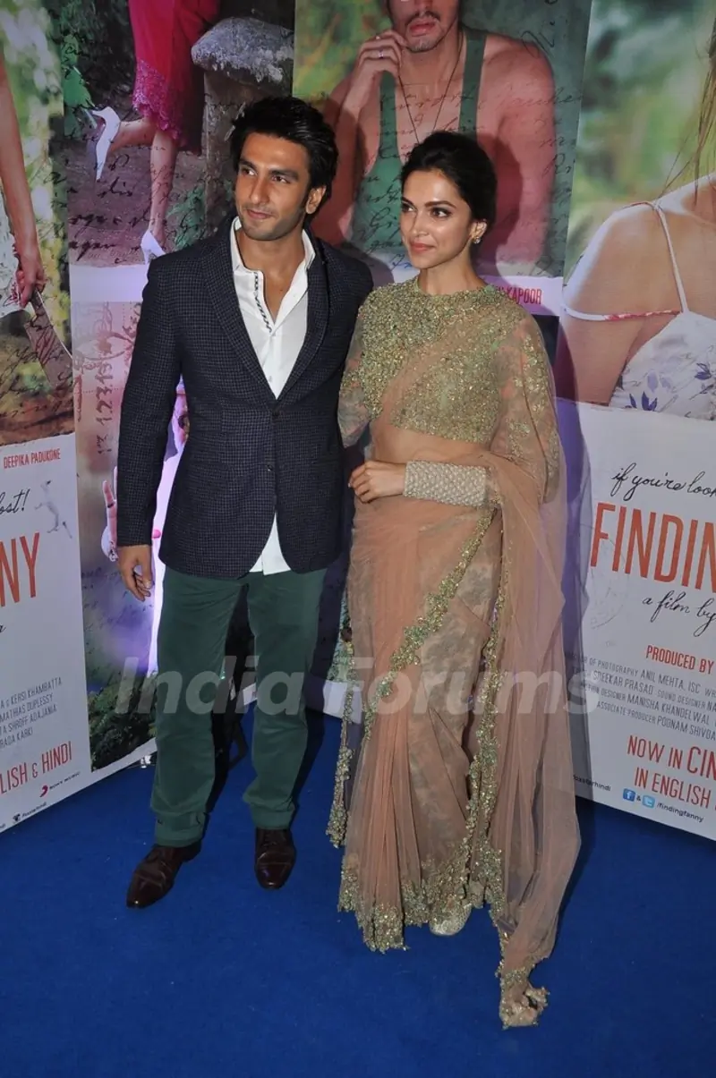 Ranveer Singh and Deepika Padukone pose for the media at the Success Bash of Finding Fanny
