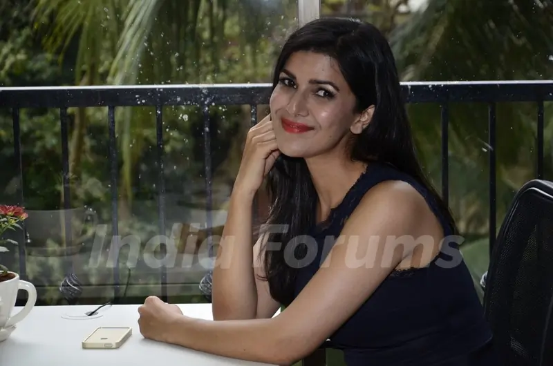Nimrat Kaur gives a smiling pose for the camera at the Launch of Juice Magazine