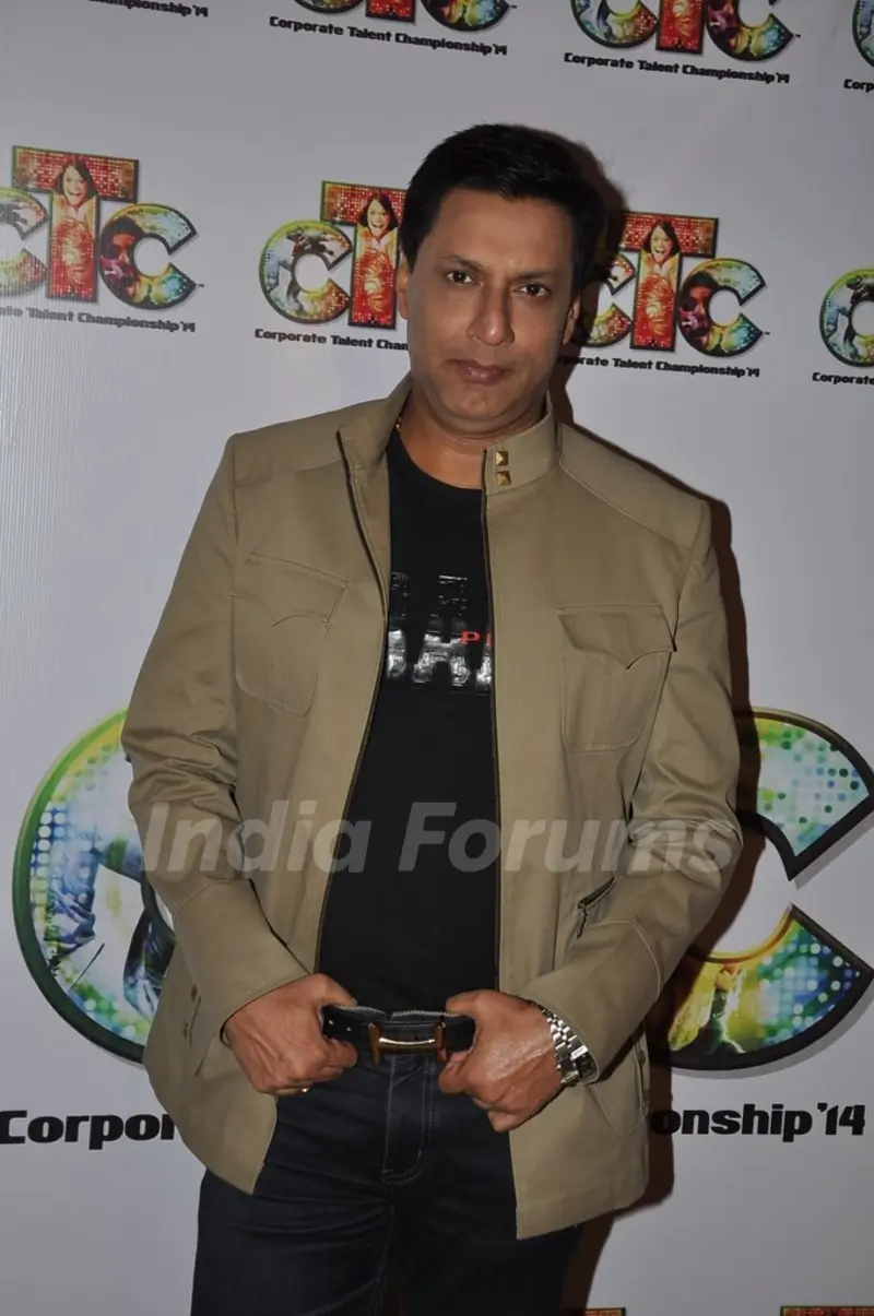Madhur Bhandarkar poses for the media at Corporate Competition