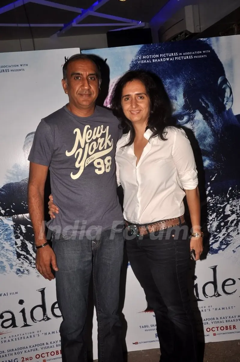Milan Luthria poses with wife at the Special Screening of Haider