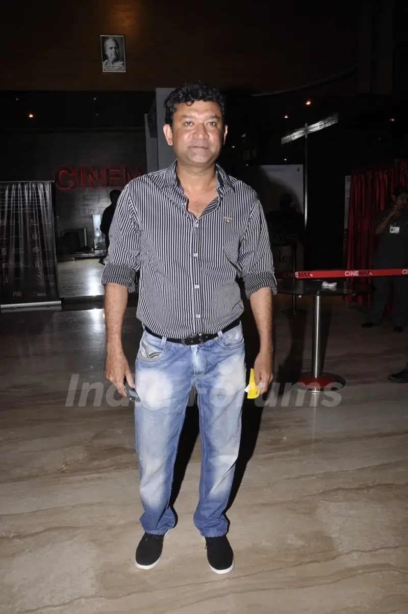 Ken Ghosh poses for the media at the Special Screening of Haider hosted by Tabu
