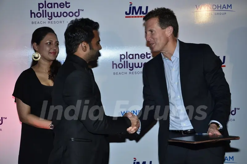Sachin Joshi greets a delegate at the Launch of Planet Hollywood