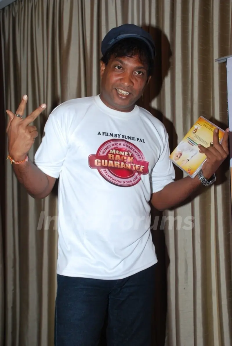 Sunil Pal poses for the media at Mohit Chauhan's Song Launch