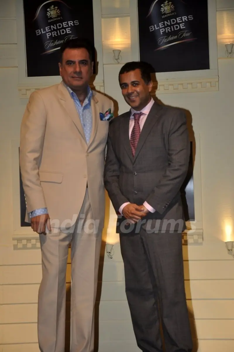 Boman Irani and Chetan Bhagat pose for the media at Blender's Pride Tour