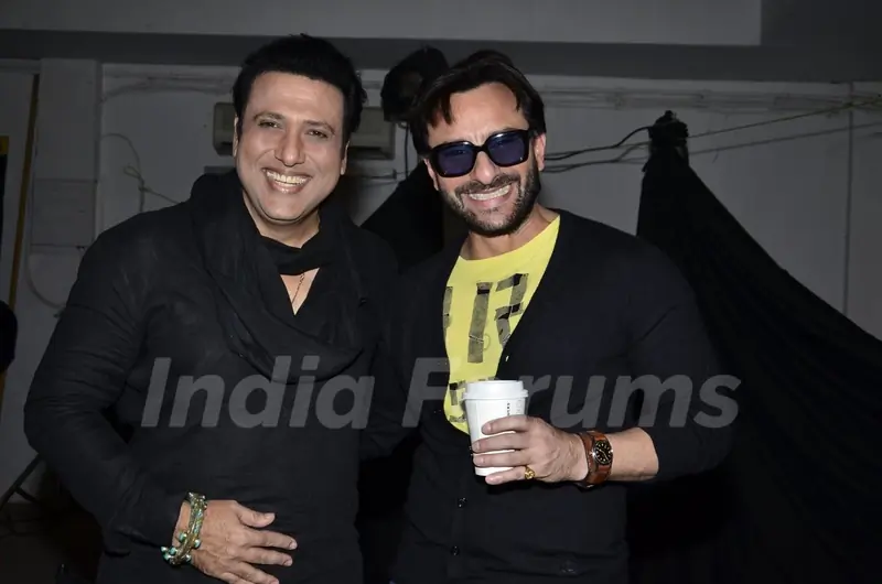 Govinda and Saif Ali Khan pose for the media at Happy Ending Media Interactions