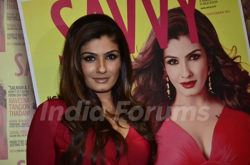 Raveena Tandon poses with the New Cover of Savvy at the Launch
