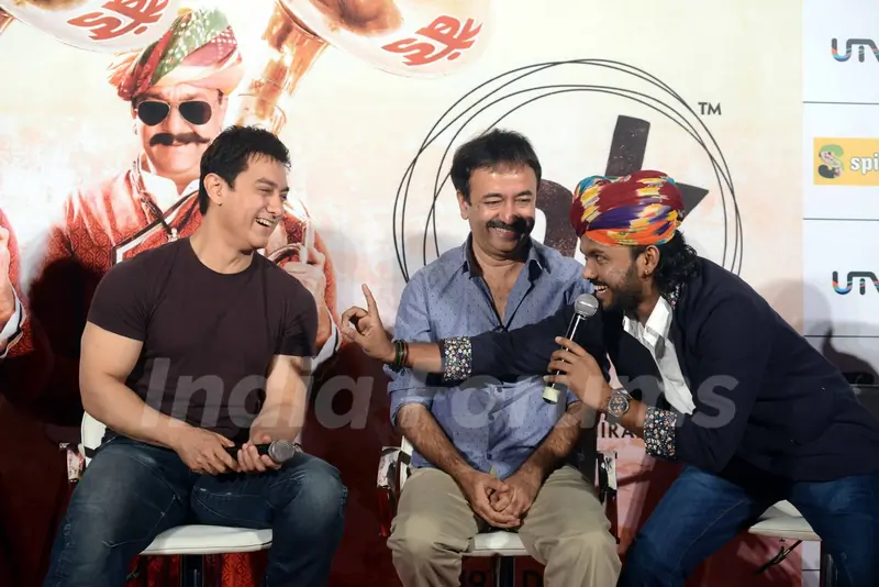 Aamir Khan interacts with the singer at the Song Launch of P.K.