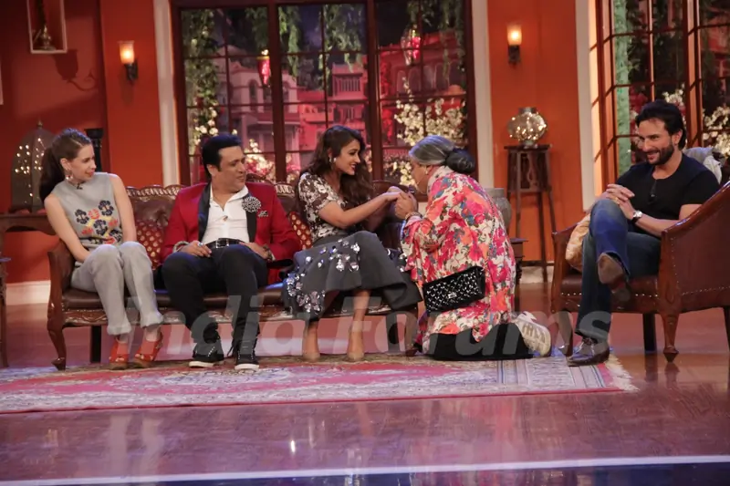 Dadi performs an act with Ileana D'Cruz at the Promotion of Happy Ending on Comedy Nights With Kapil