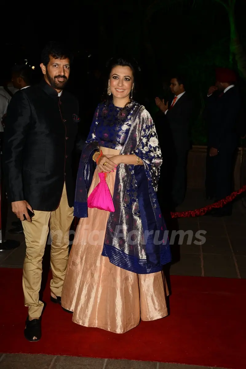 Kabir Khan poses with wife Mini Mathur at Arpita Khan's Wedding Reception