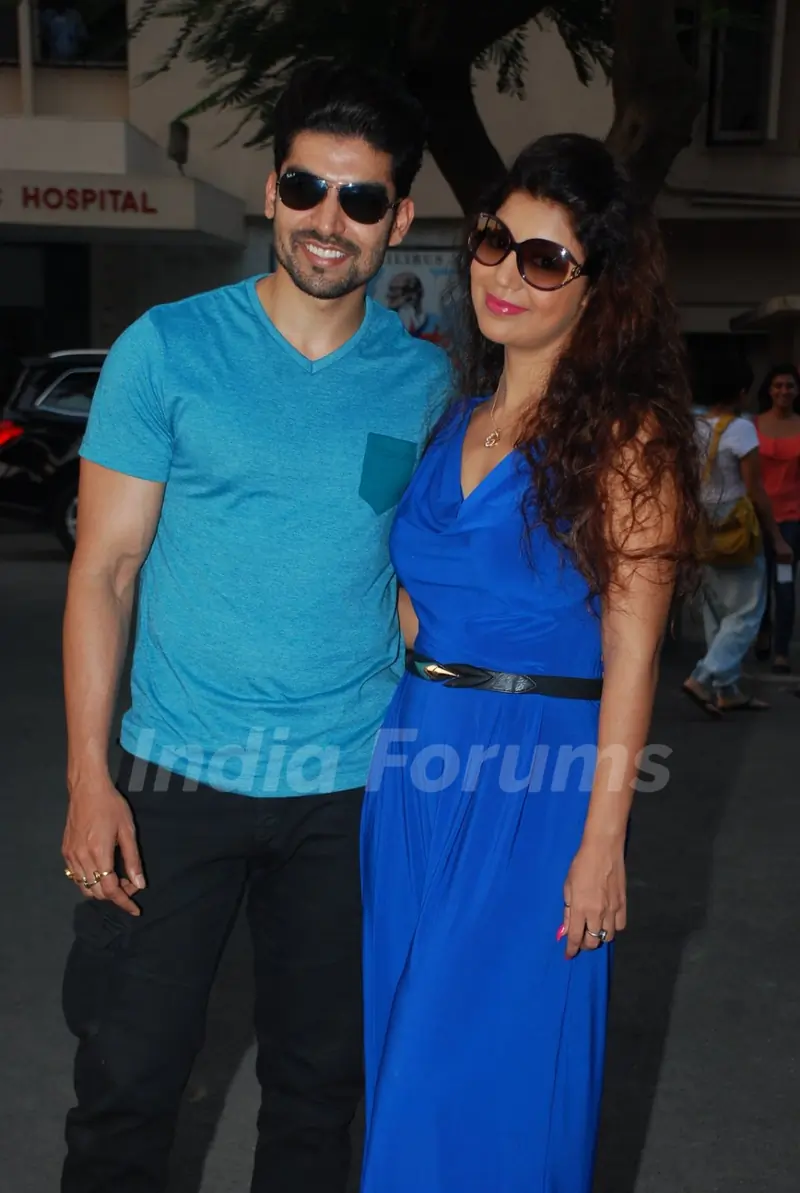 Gurmeet Choudhary and Debina Bonnerjee Choudhary pose for the media at the Pet Adoptathon 2014
