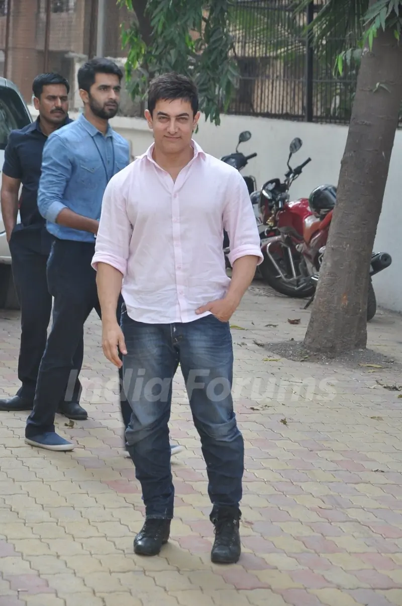 Aamir Khan poses for the media at P.K. Game Launch