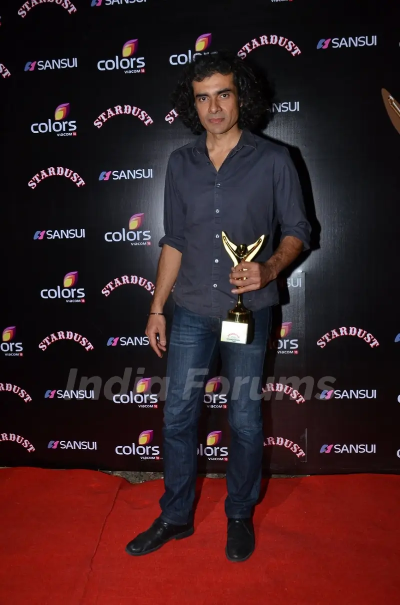 Imtiaz Ali poses for the media at Sansui Stardust Awards Red Carpet