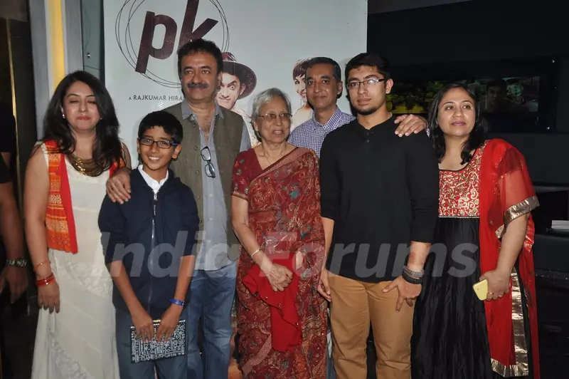 Rajkumar Hirani poses with guests at the Special Screening of P.K. for the Cast and Crew