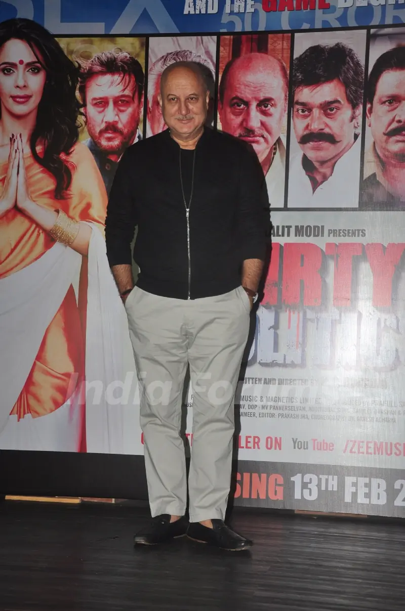 Anupam Kher poses for the media at the Press Conference of Dirty Politics