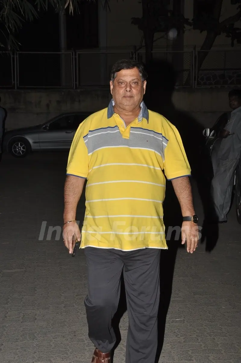 David Dhawan poses for the media at the Special Screening of Tevar