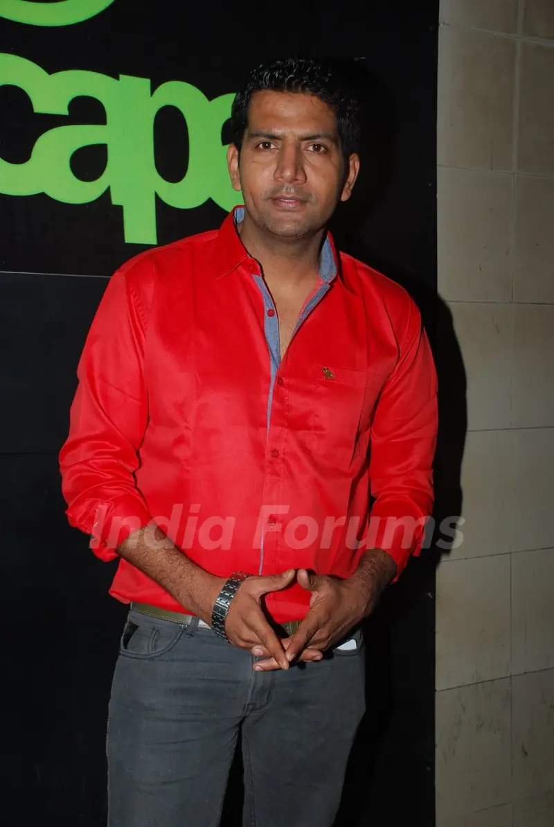 Ashutosh Kaushik poses for the media at Kamaal Rashid Khan's Birthday Bash