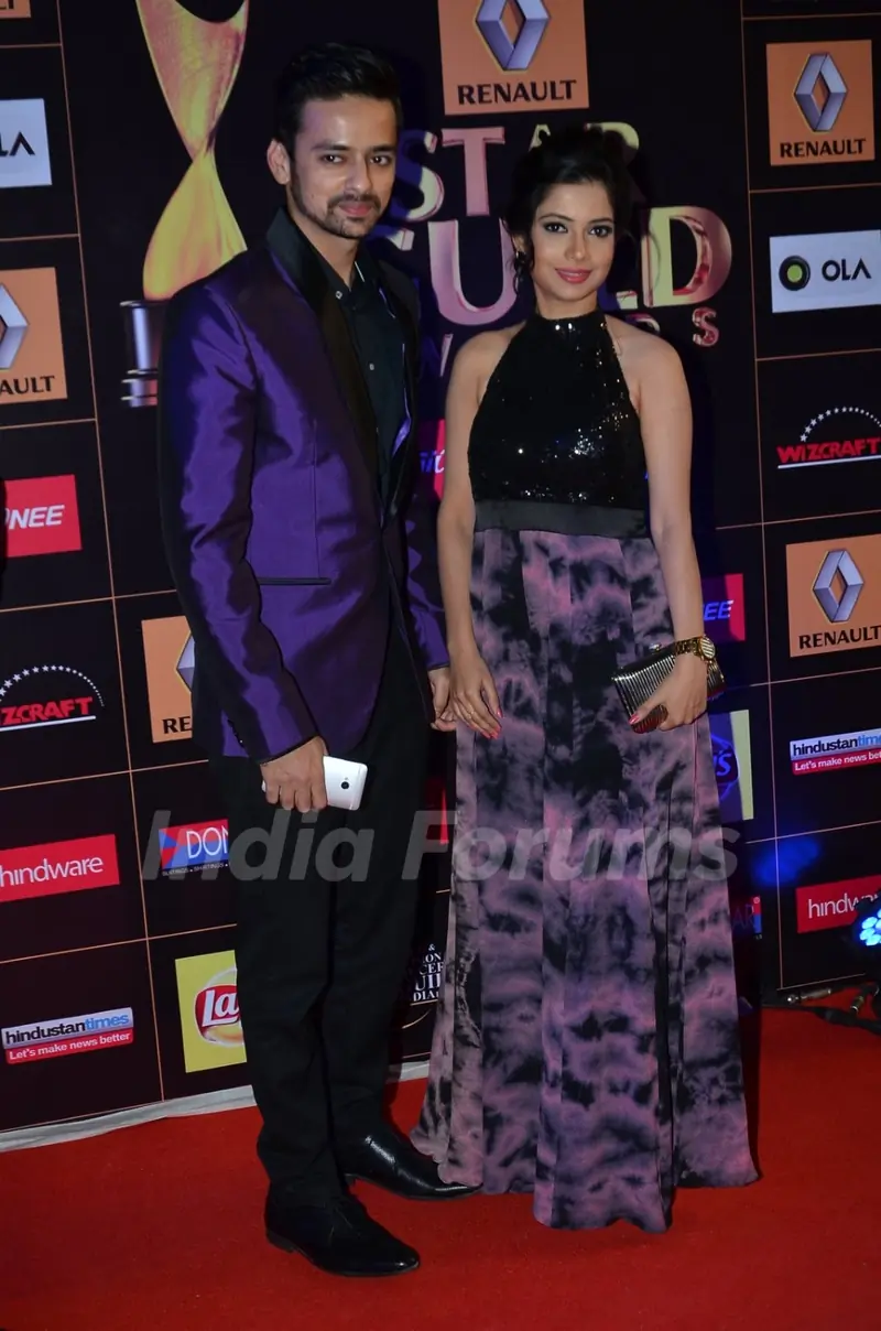 Varunn Jain and Pooja Singh pose for the media at Star Guild Awards