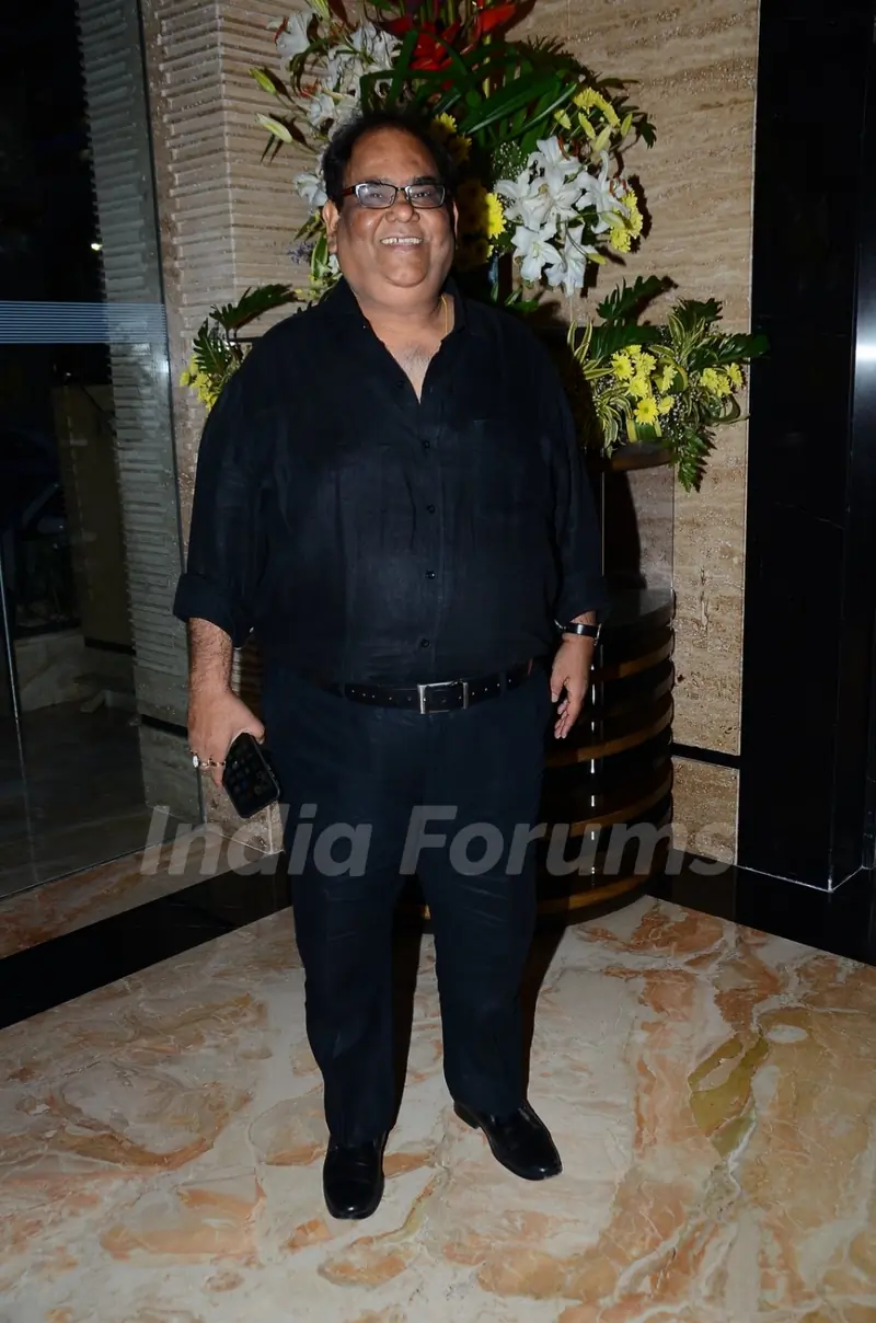 Satish Kaushik poses for the media at Irshad Kamil's Book Launch
