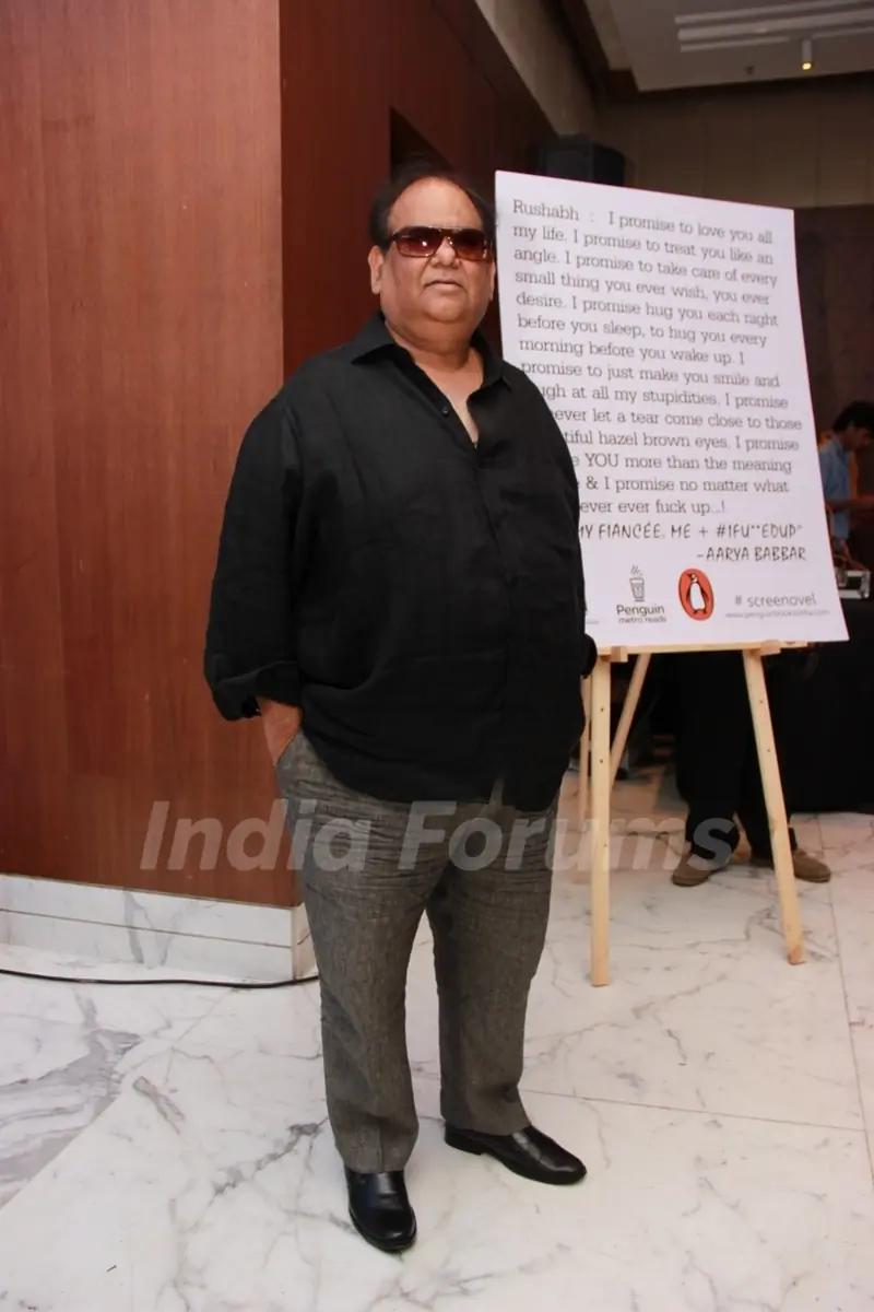 Satish Kaushik poses for the media at Arya Babbar's Book Launch