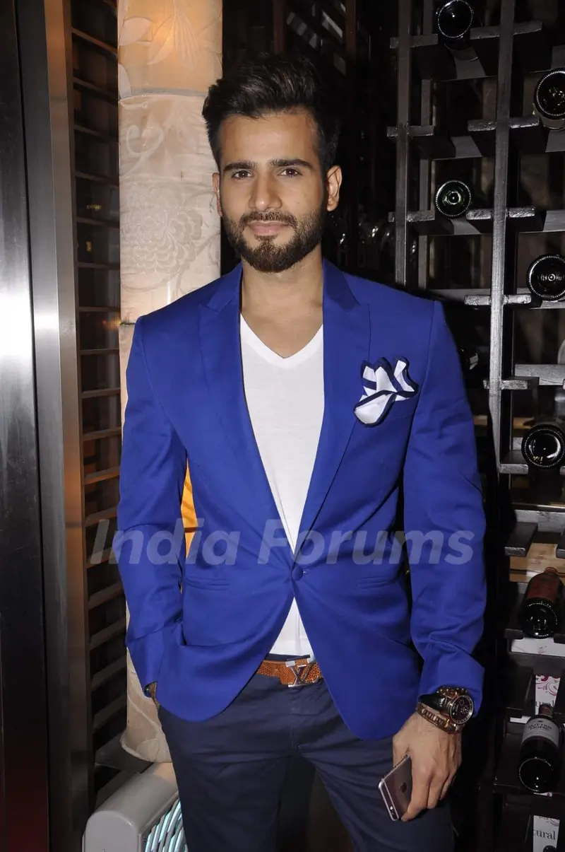 Karan Tacker poses for the media at Masala Library Launch