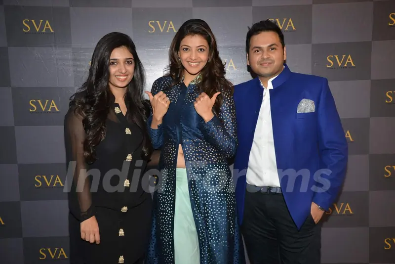 Kajal Aggarwal poses with Sonam and Paras Modi at SVA Store Launch