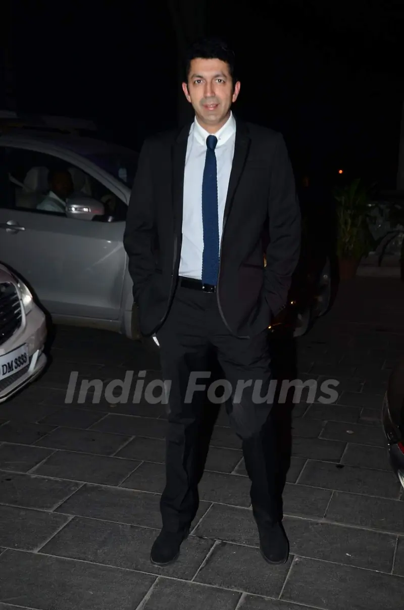Kunal Kohli poses for the media at Tulsi Kumar's Wedding Reception