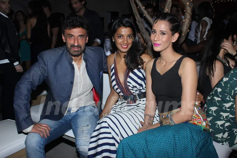 Rahul Dev and Mugdha Godse pose for the media at Tom Tailor and Jabong Bash