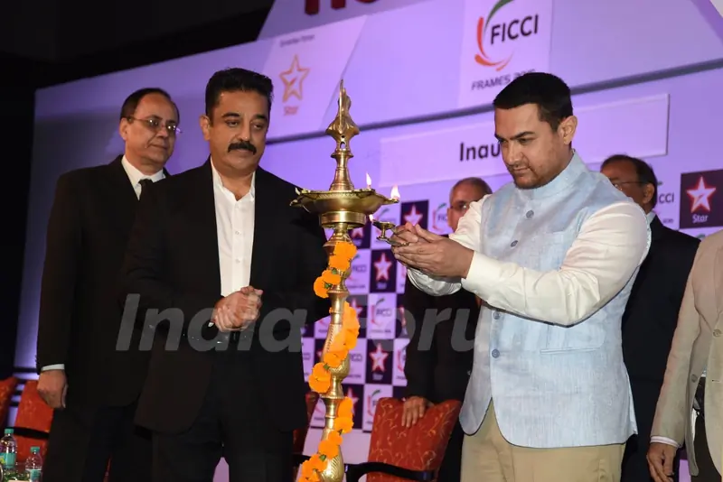Aamir Khan lights the lamp at FICCI Frames 2015 Inaugural Session