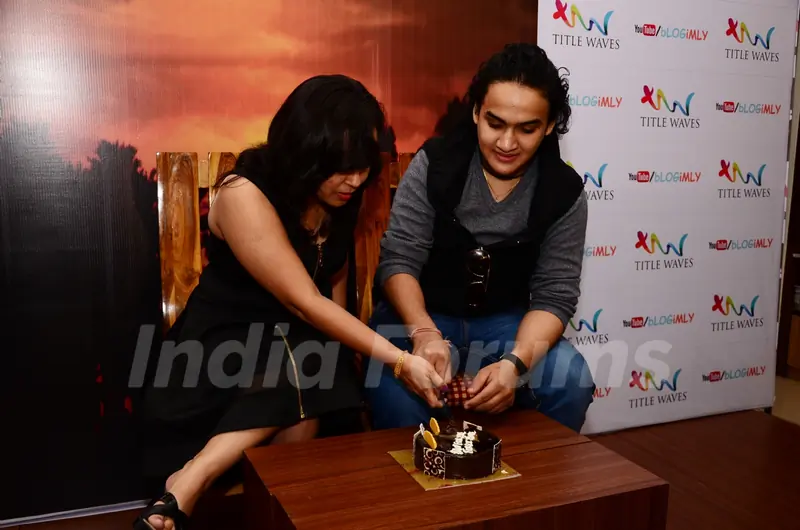 Faisal Khan cuts a cake at Book Signing Event