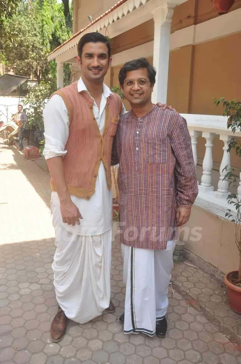 Sushant Singh Rajput and Anand Tiwari pose for the media at the Promotions