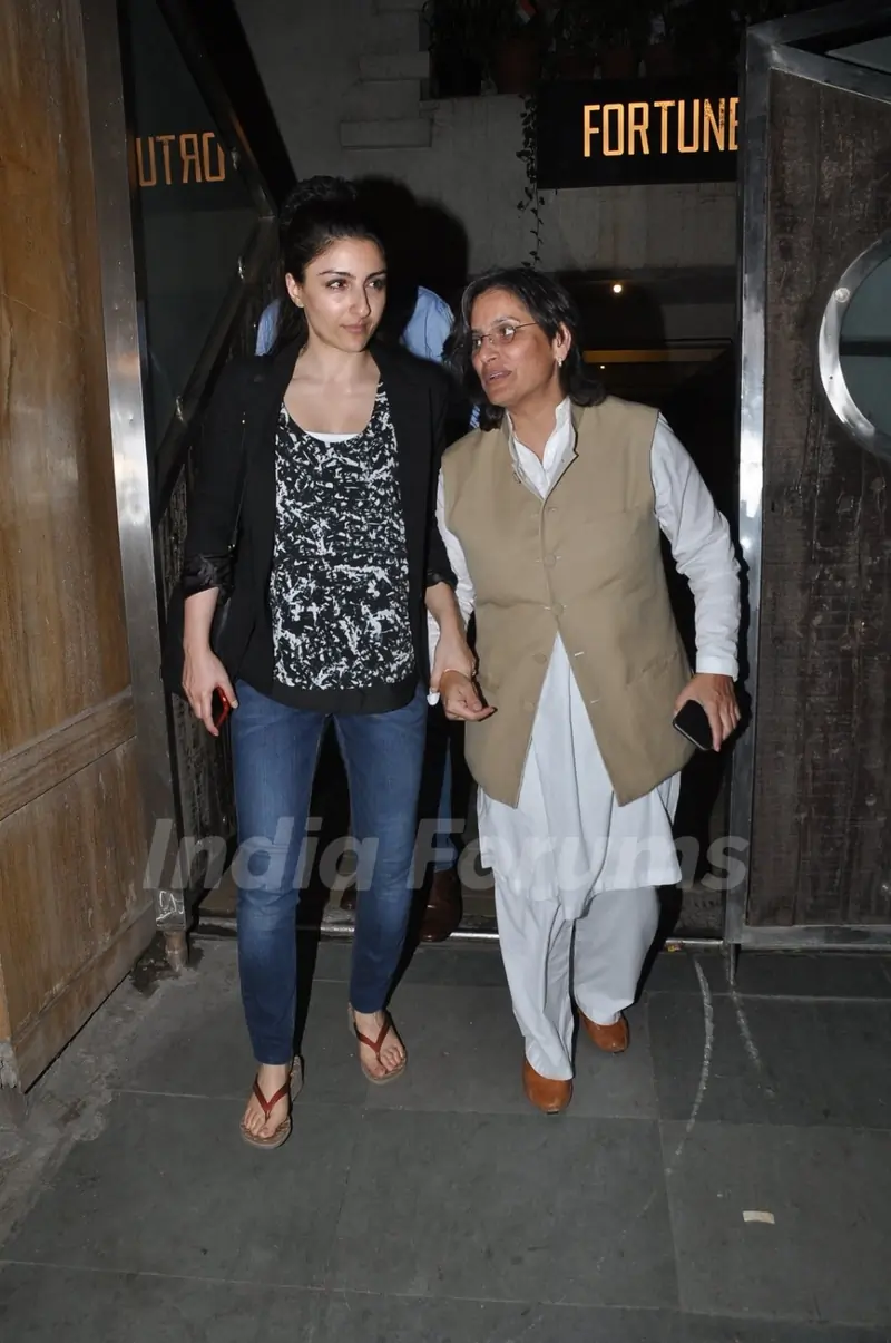 Soha Ali Khan was snapped with a guest at Saif Ali Khan and Kareena Kapoor Khan's Bash