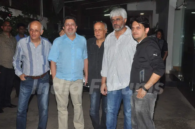 The Bhatts pose with a friend at the Special Screening of Detective Byomkesh Bakshy!