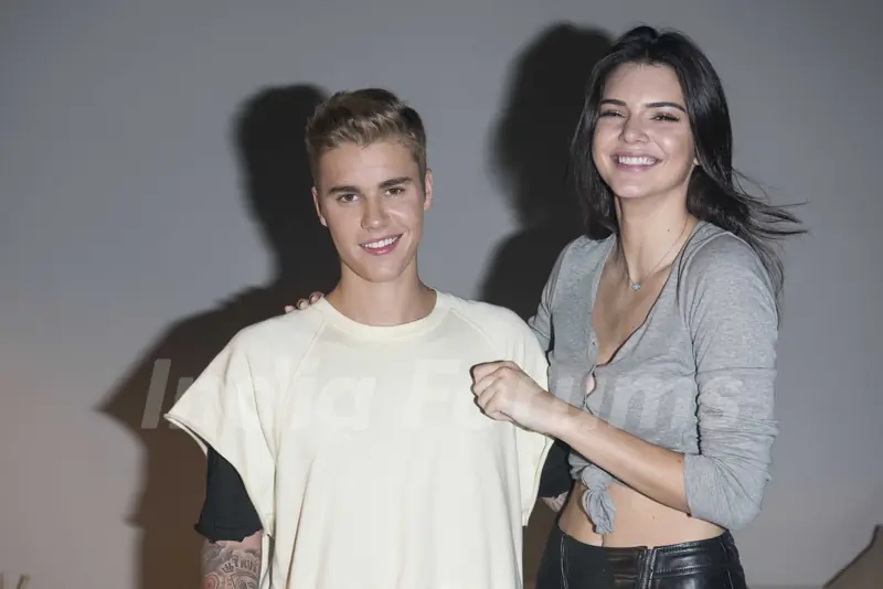 Justin Bieber and Kendall Jenner pose for the media at Calvin Klein Jeans Music Event in Hong Kong