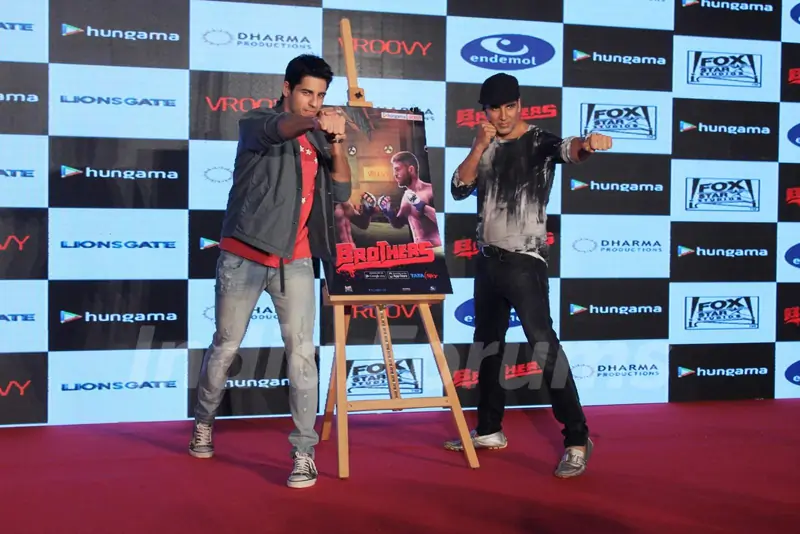 Akshay Kumar and Sidharth Malhotra pose for the media at the Launch of Brothers Mobile Game