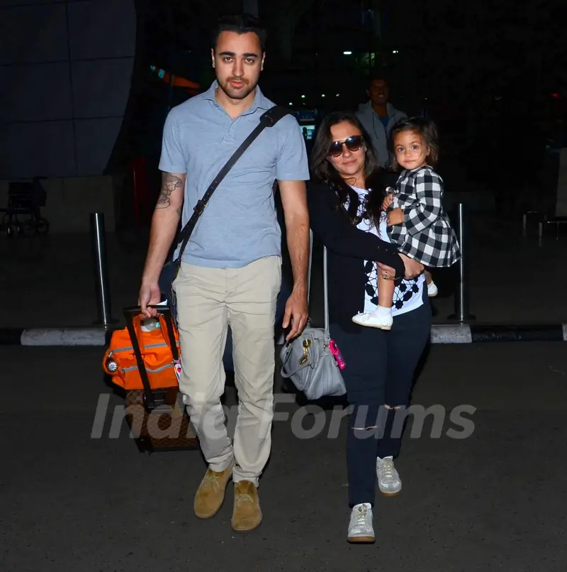 Imran Khan Snapped with wife Avantika and daughter Imara at Airport